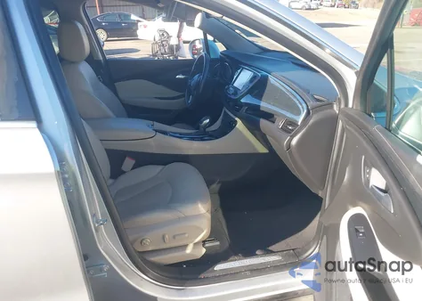 2017 Buick Envision Essence z USA, uszkodzony, nr VIN LRBFXBSA7HD111851